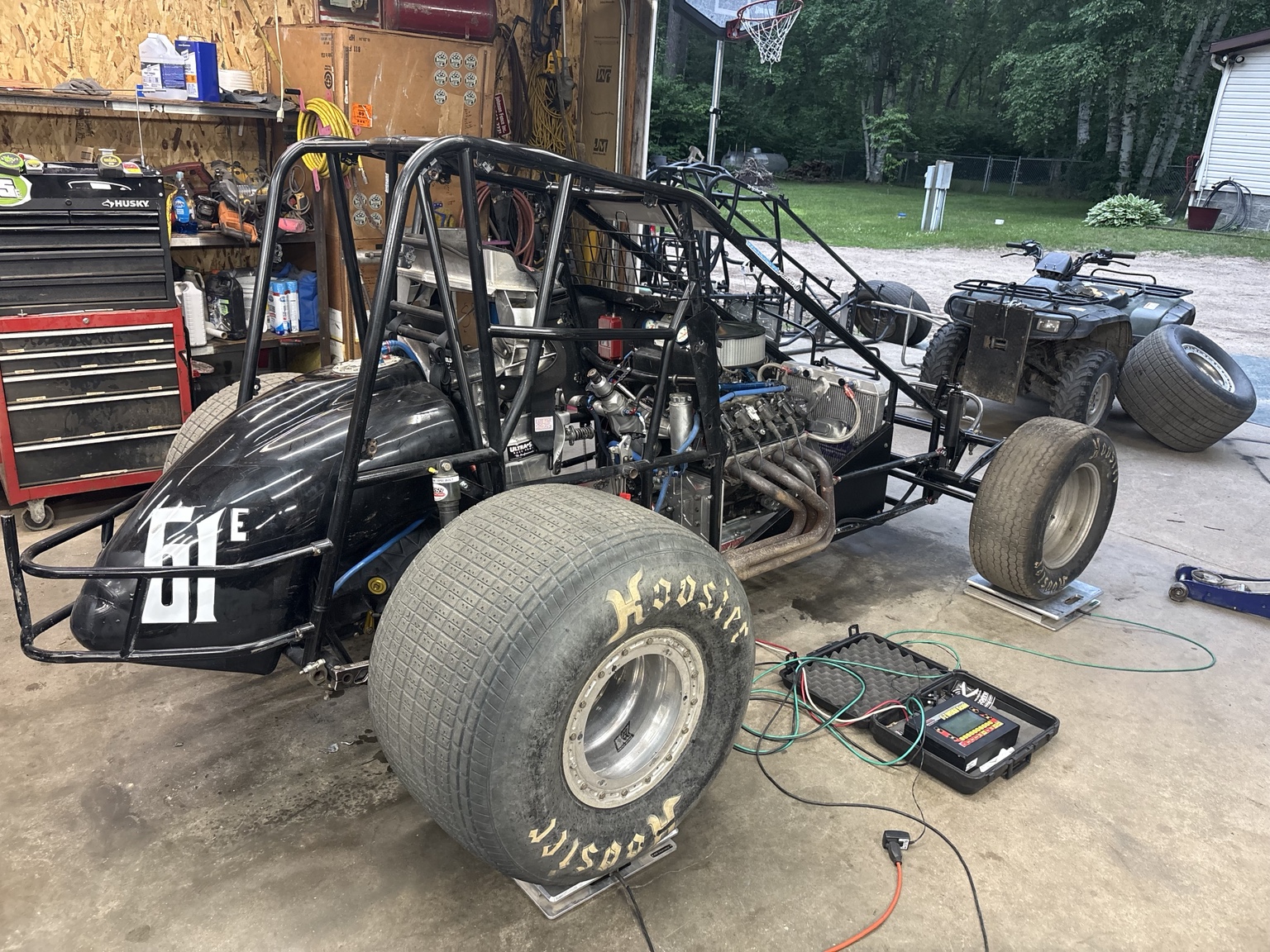 Sprint car on scales for setup evaluation